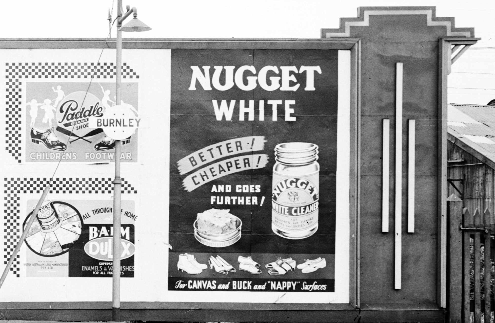 Historic advertising sign viewed from Burnley Railway Station, 1933-1934 Victoria. Source: State Transport Authority VPRS 12800/P0003, ADV 1827.